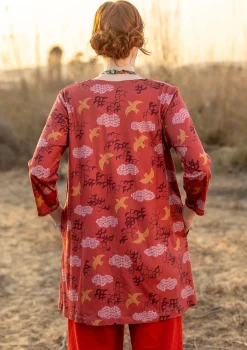 Gudrun Sjödén Tuniken>Jerseytunika „Flyttfågel“ aus Bio-Baumwolle Kürbis